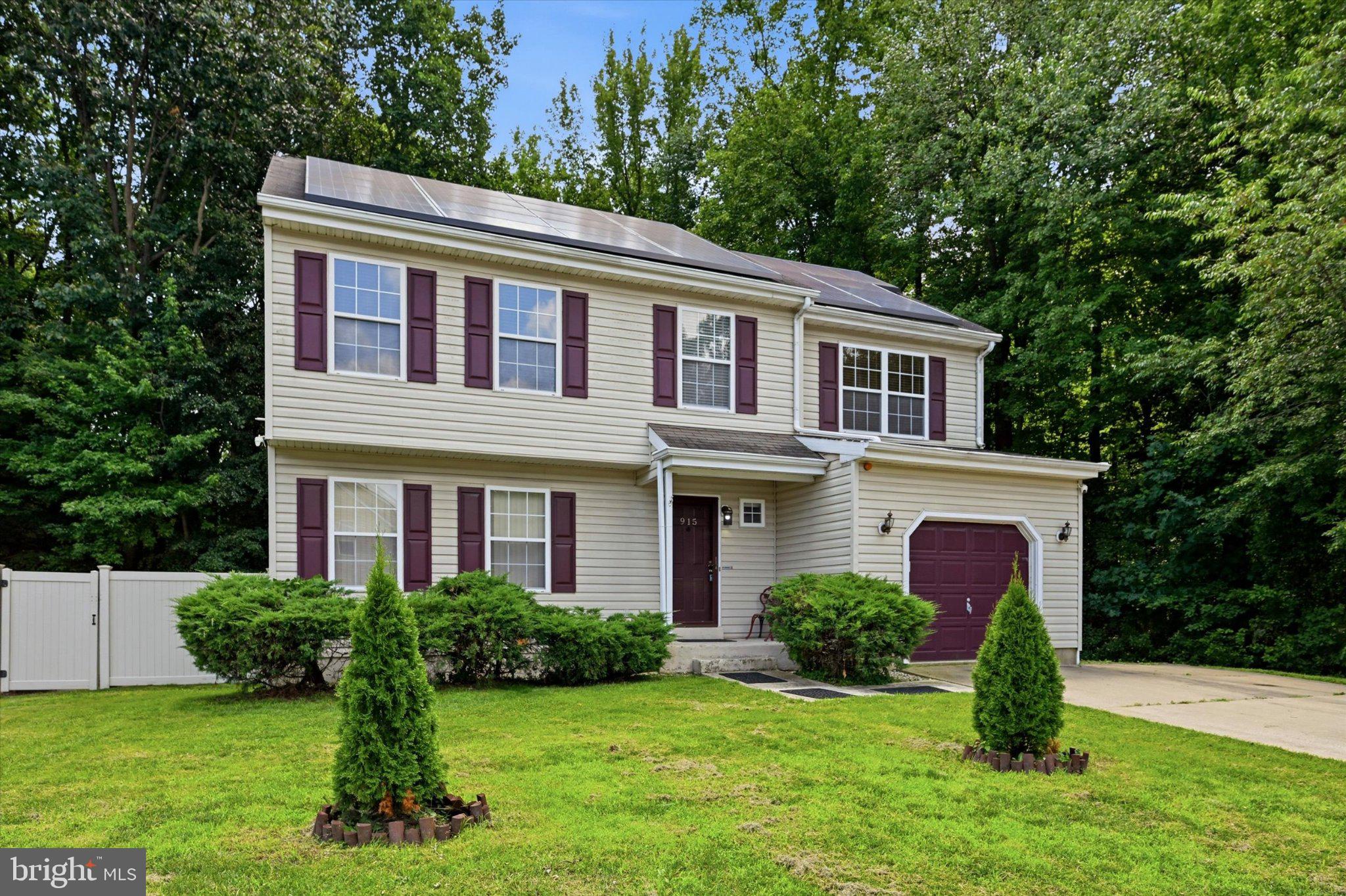 915 Rue Madora Bear, DE 19701 - Photo 14 of 14 Charming home nestled in lush greenery.