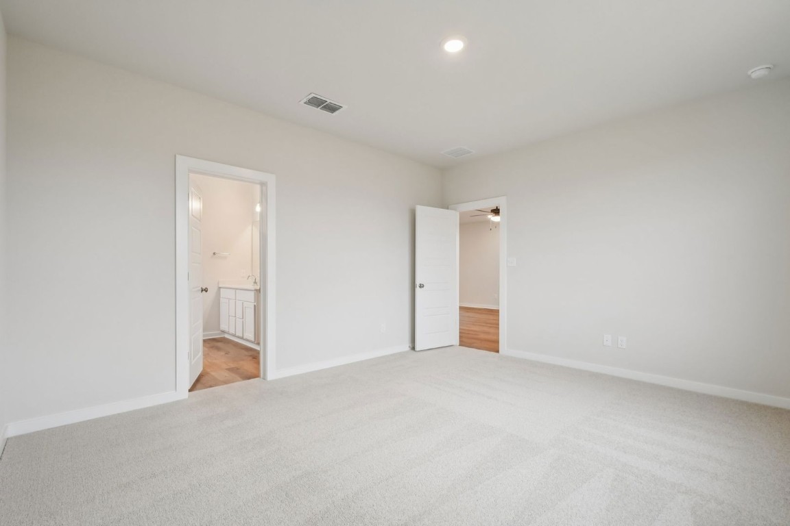 13417 Derby Ride Drive Buda, TX 78610 - Photo 19 of 38 a view of an empty room