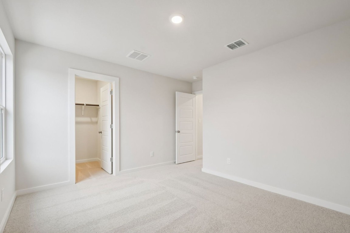 13417 Derby Ride Drive Buda, TX 78610 - Photo 26 of 38 a view of an empty room