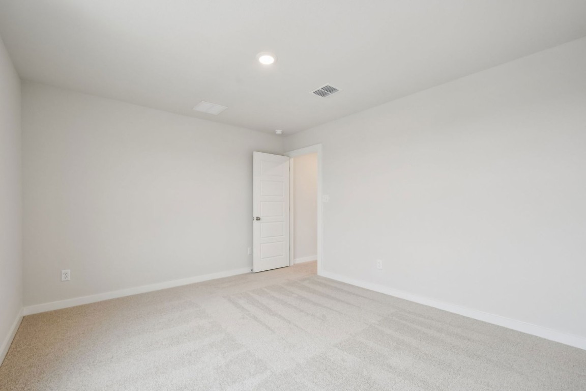 13417 Derby Ride Drive Buda, TX 78610 - Photo 7 of 38 a view of an empty room