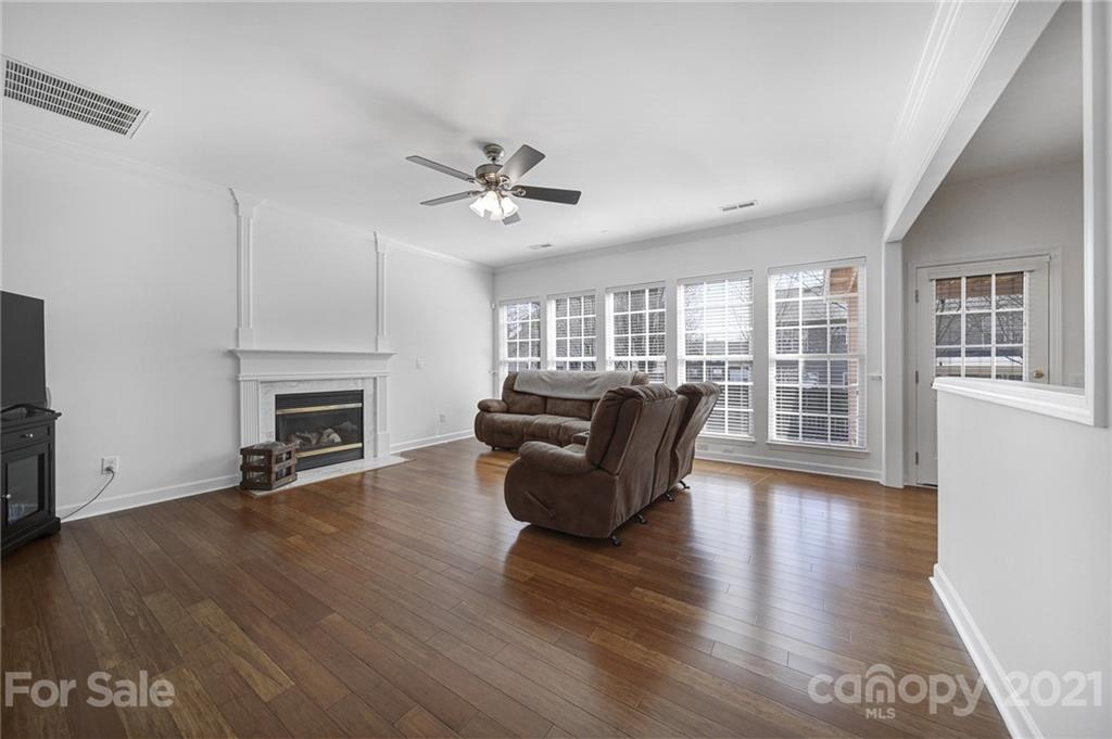 115 Anchura Road Fort Mill, SC 29708 - Photo 14 of 48 a living room with furniture and a fireplace