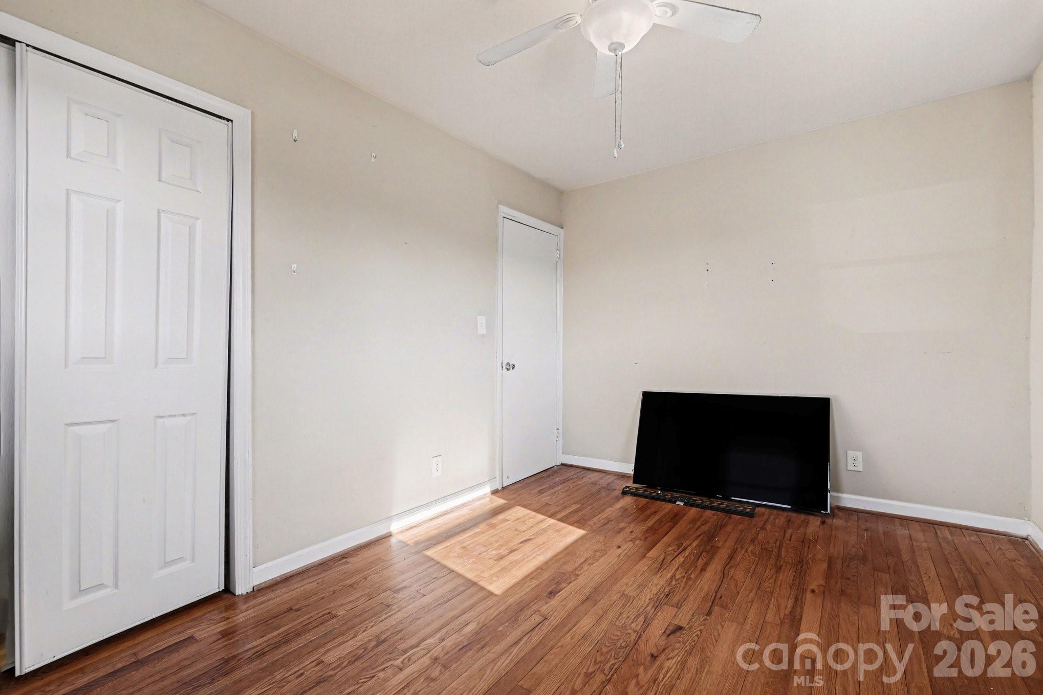 110 Abell Street Chester, SC 29706 - Photo 15 of 29 a view of empty room with wooden floor