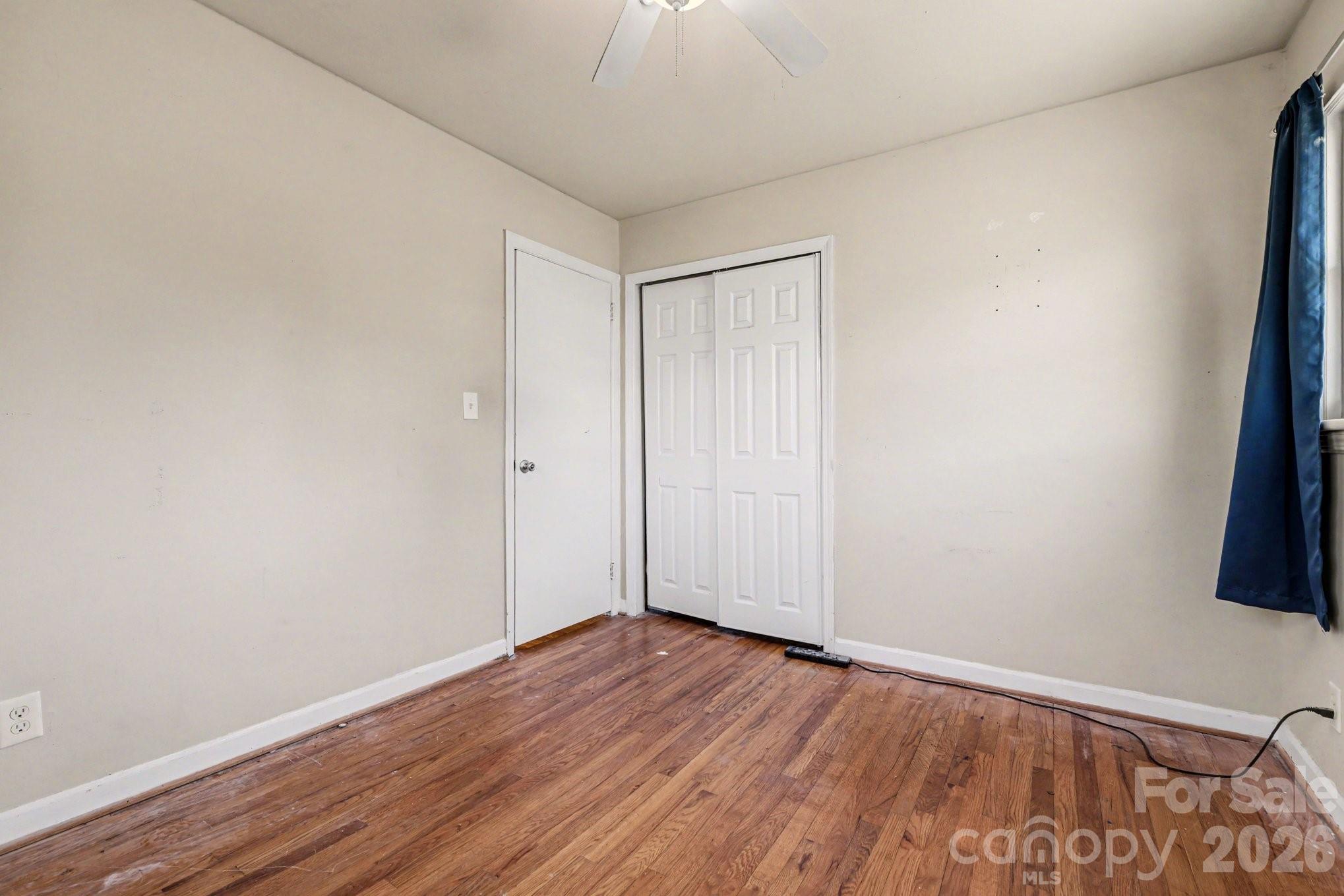110 Abell Street Chester, SC 29706 - Photo 17 of 29 a view of an empty room with wooden floor