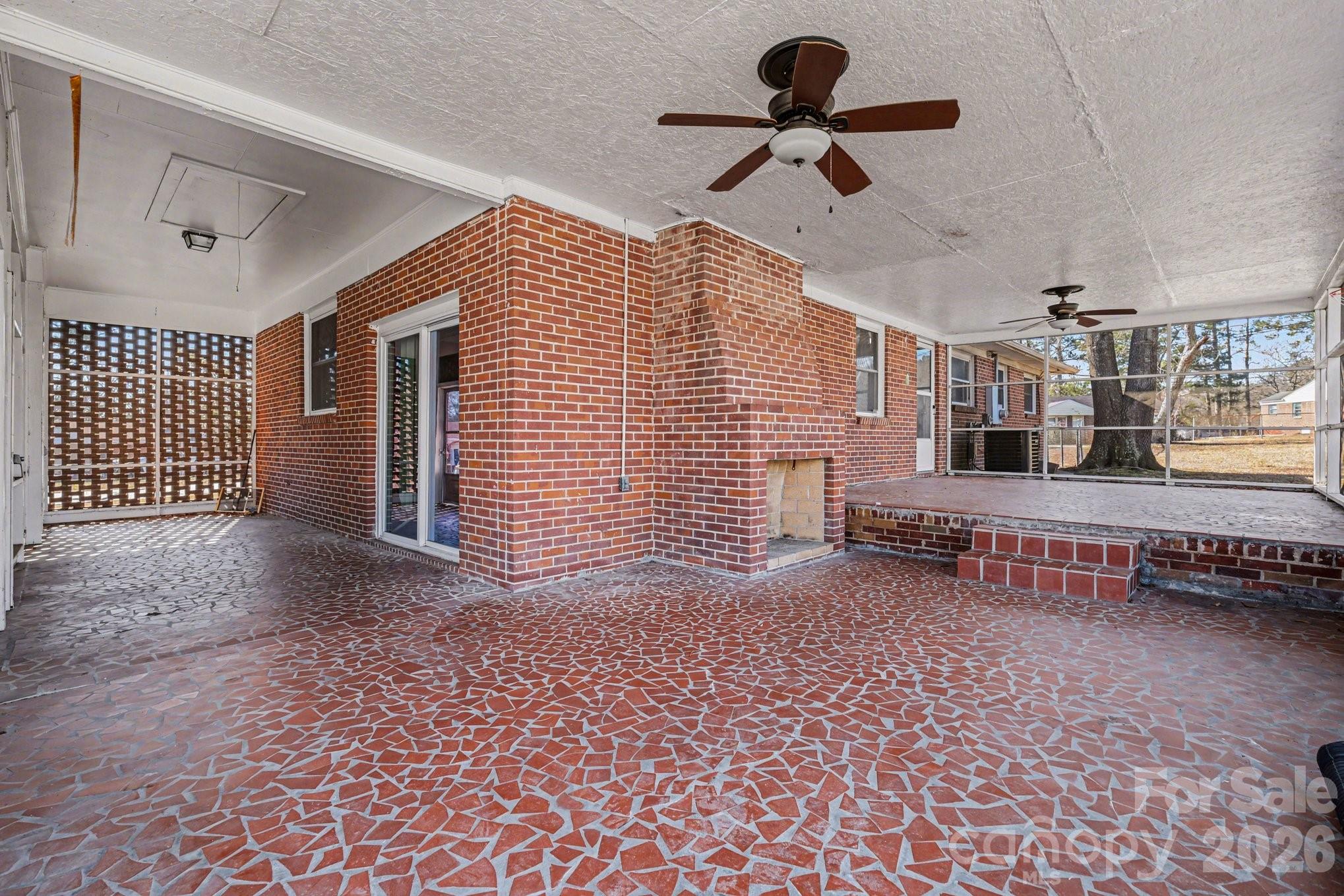 110 Abell Street Chester, SC 29706 - Photo 25 of 29 a view of a livingroom with a chair and ceiling fan