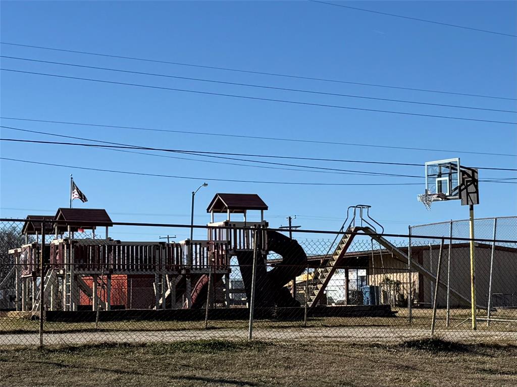 0 Maple Gun Barrel City, TX 75156 - Photo 3 of 4 a view of a house with wooden deck