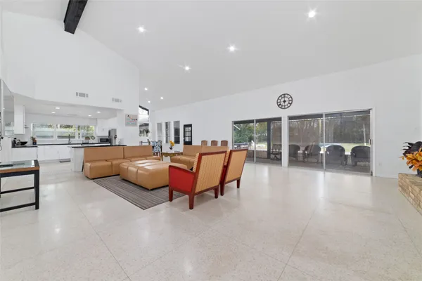 a living room with furniture and a table