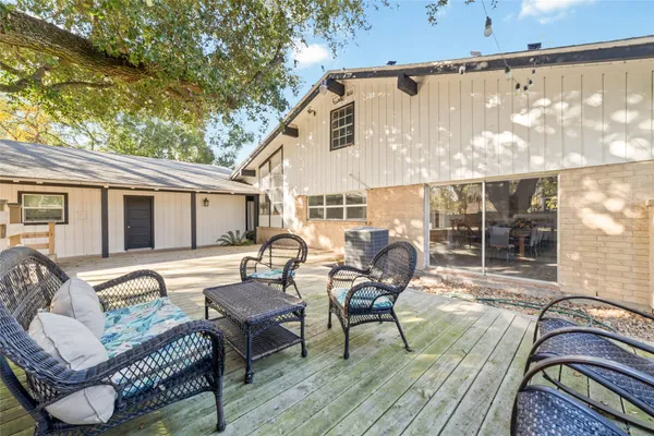 a view of a dinning table and chair in the patio