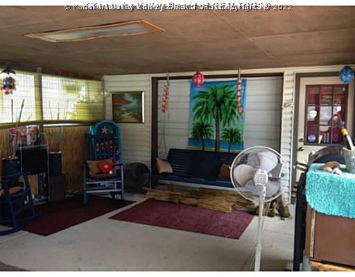 60 Five Mile Road Tad, WV 25201 - Photo 5 of 16 Exterior Front. Screened porch on back. Entry from back yard or from inside garage.