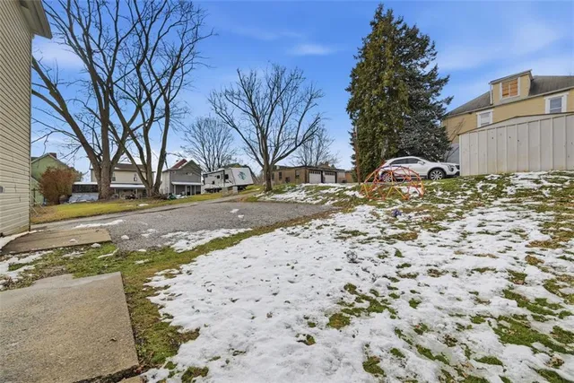 a view of road with snow on the road
