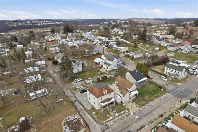 an aerial view of a city with lots of residential buildings