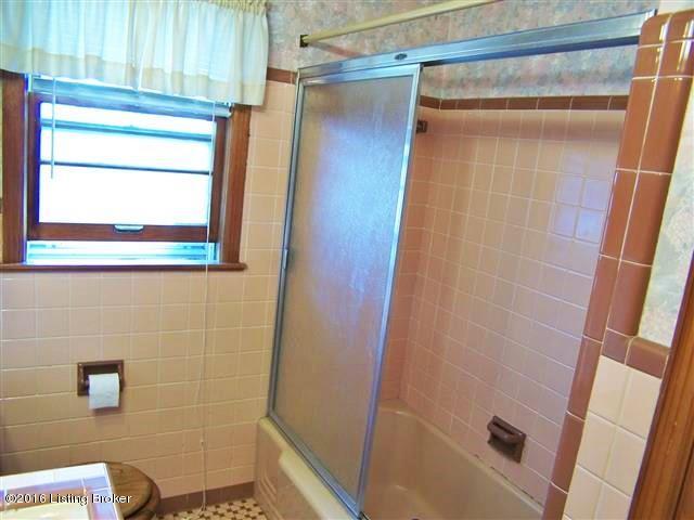 4604 Dover Road Louisville, KY 40216 - Photo 27 of 37 Full Bath with room for a his and her sink, linen closet, shower/tub unit, 2 medicine cabinets and over-the-toilet storage.