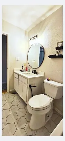 a bathroom with a sink and a shower