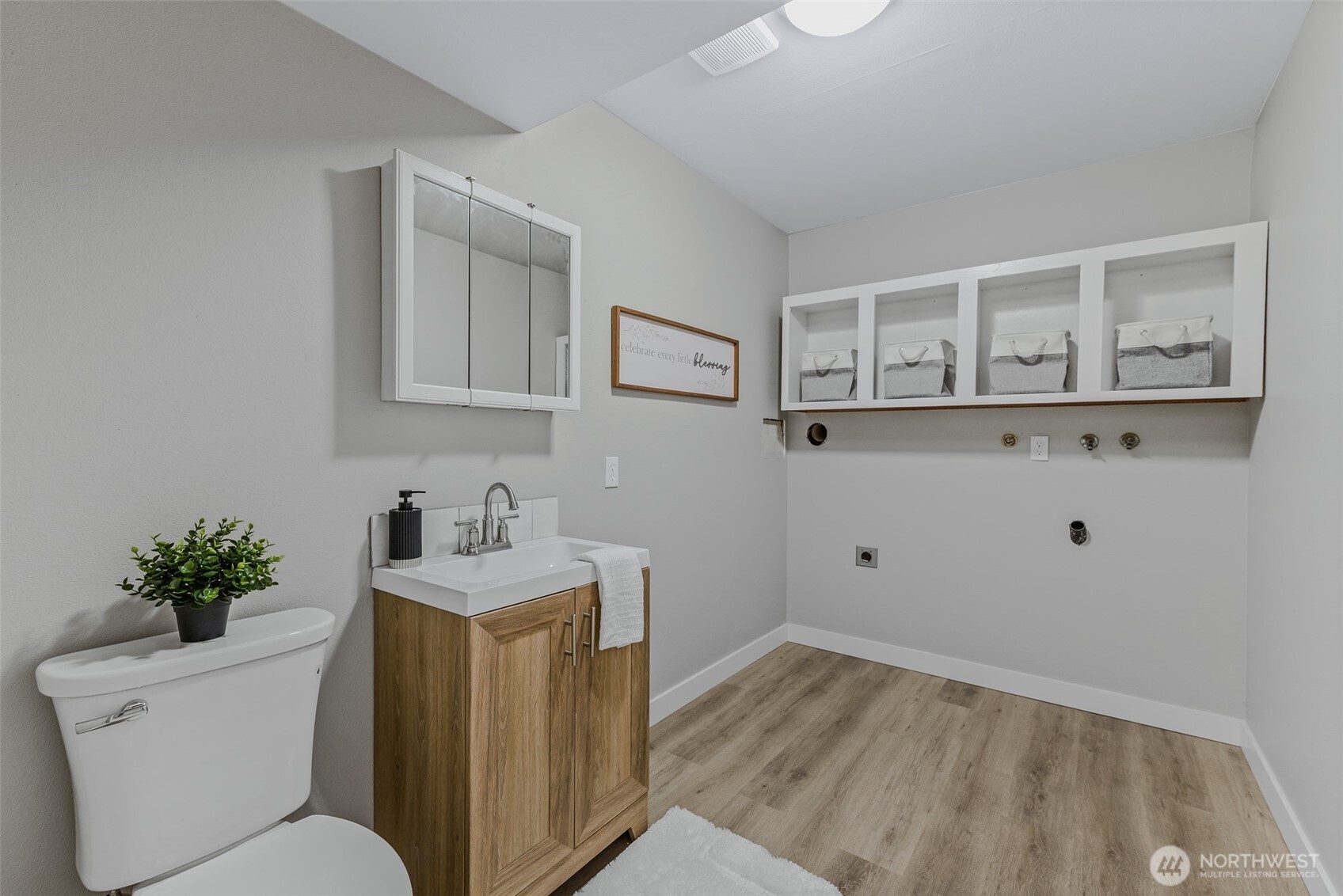 3162 Northwest Kent Street Camas, WA 98607 - Photo 31 of 40 a bathroom with a toilet sink and vanity