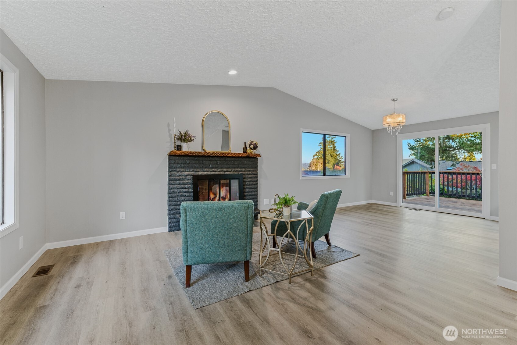3162 Northwest Kent Street Camas, WA 98607 - Photo 5 of 40 a living room with furniture and a fireplace