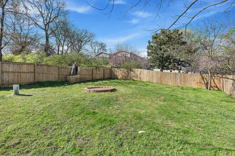 a view of a backyard with a garden