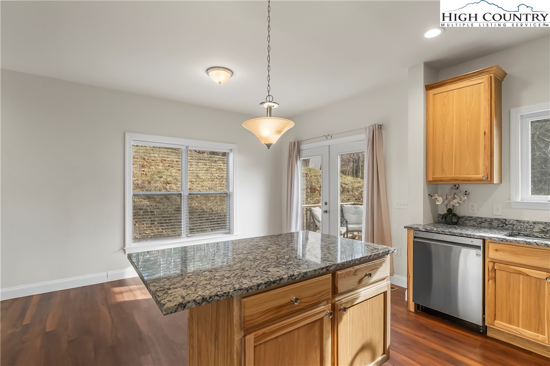262 Old Bristol Road Boone, NC 28607 - Photo 5 of 38 a kitchen with granite countertop cabinets stainless steel appliances a sink and a window