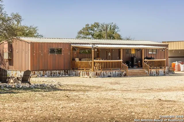a view of a house with a patio