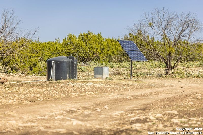 985 County Road 316 Christoval, TX 76935 - Photo 12 of 19 a view of a yard with a house