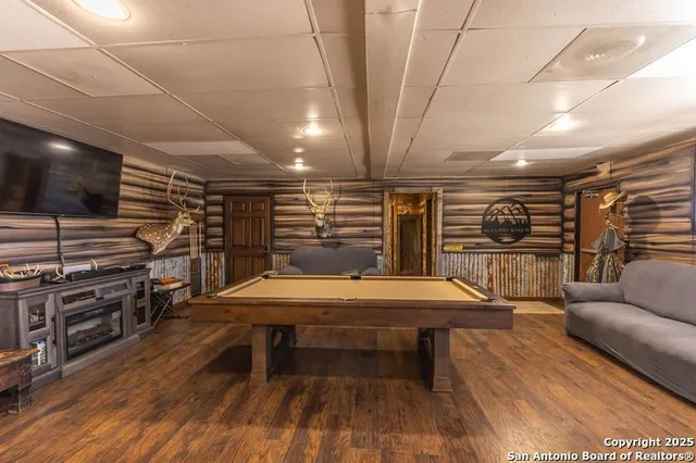 a room with furniture and wooden floor