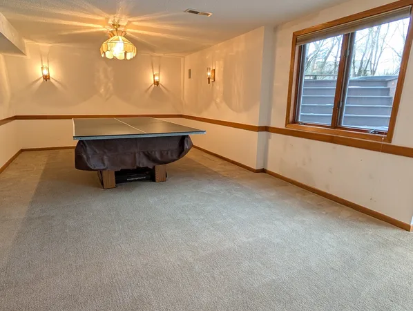 a room with furniture and a window