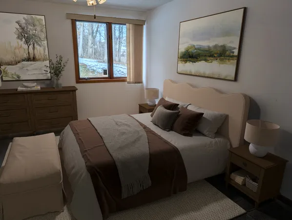 a bedroom with a bed and window