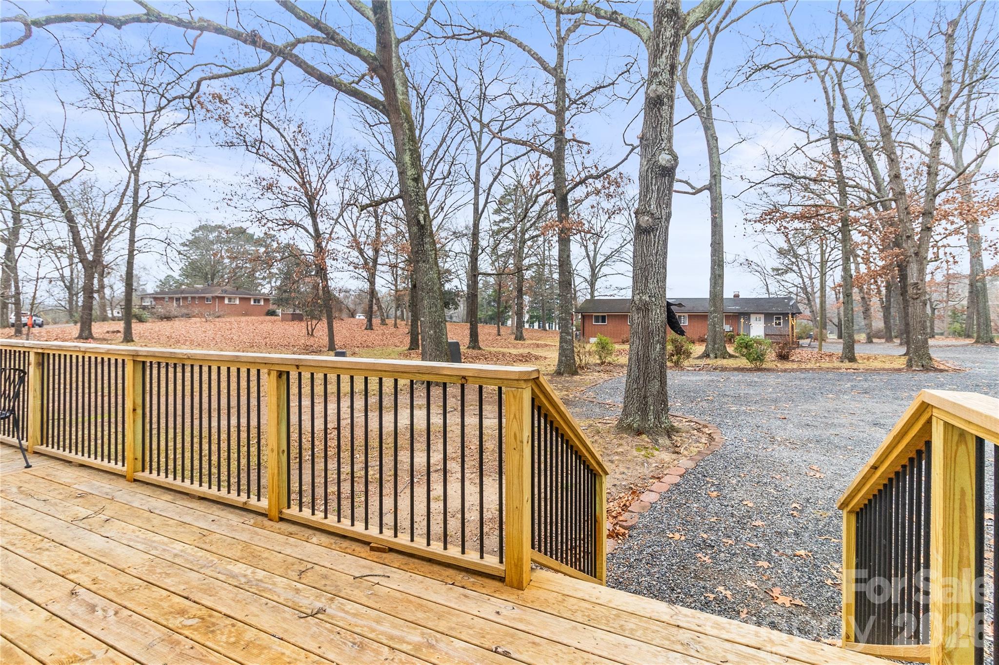 176 Odell School Road Concord, NC 28027 - Photo 11 of 46 a view of street with wooden fence