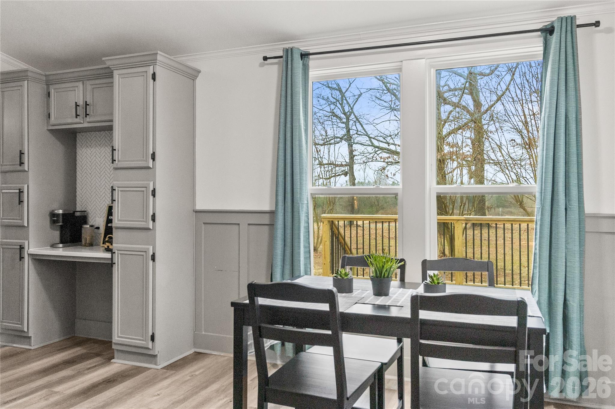 176 Odell School Road Concord, NC 28027 - Photo 13 of 46 a view of a dining room with furniture window and wooden floor