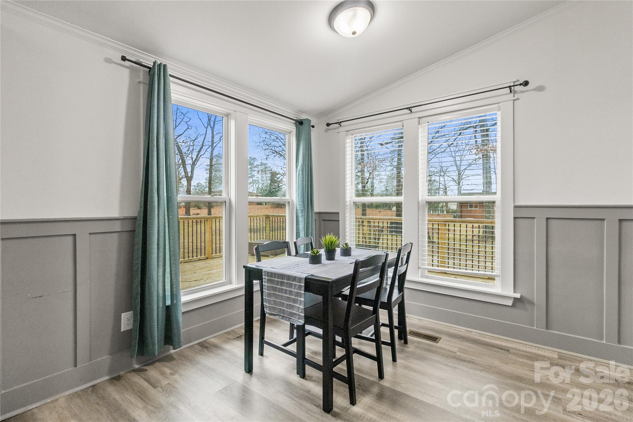 176 Odell School Road Concord, NC 28027 - Photo 14 of 46 a view of a dining room with furniture and windows
