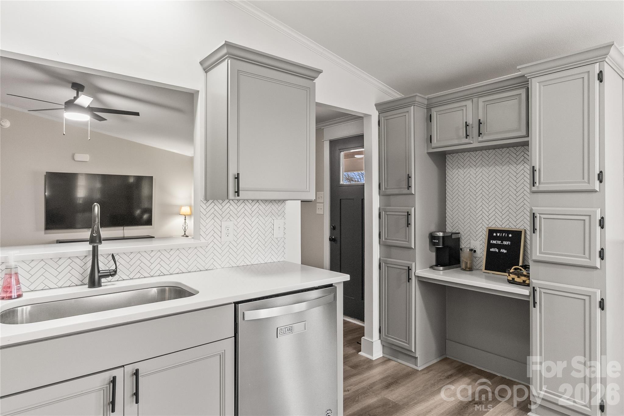 176 Odell School Road Concord, NC 28027 - Photo 16 of 46 a kitchen with a sink and refrigerator
