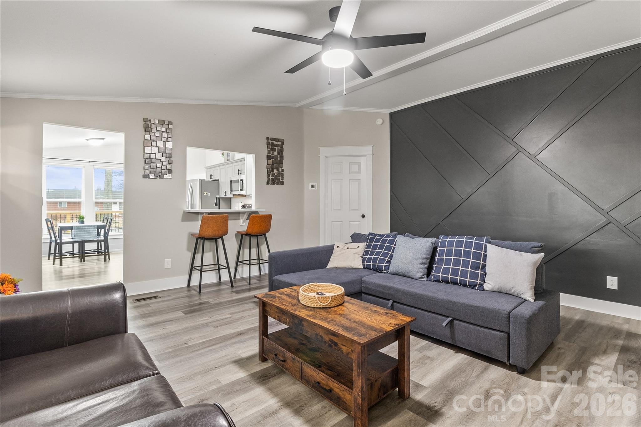 176 Odell School Road Concord, NC 28027 - Photo 22 of 46 a living room with furniture and wooden floor