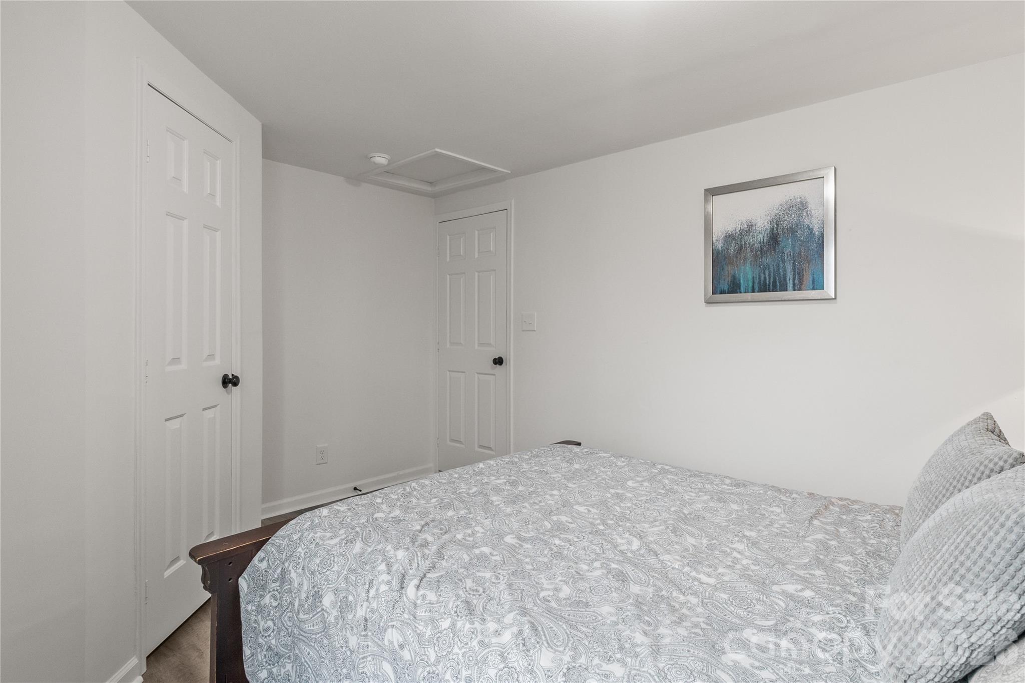 176 Odell School Road Concord, NC 28027 - Photo 34 of 46 a bedroom with a bed and a window