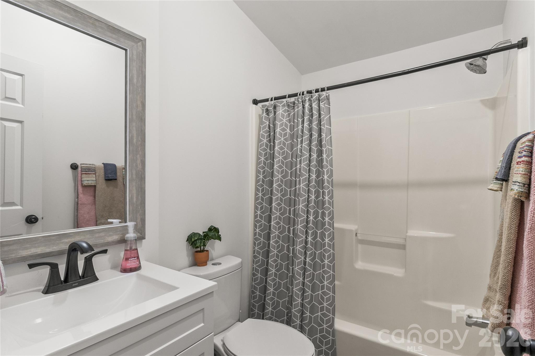 176 Odell School Road Concord, NC 28027 - Photo 36 of 46 a bathroom with a sink toilet and shower