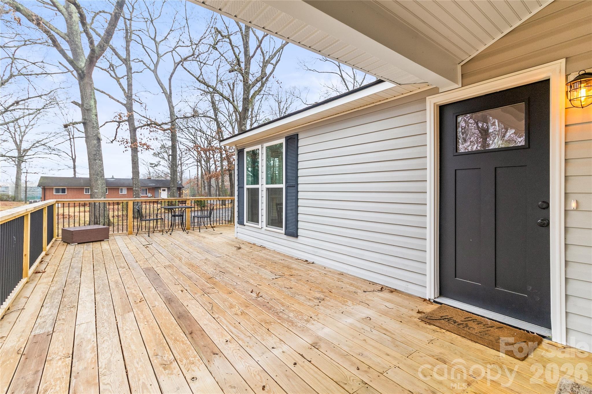 176 Odell School Road Concord, NC 28027 - Photo 6 of 46 a view of a house with wooden floor and fence