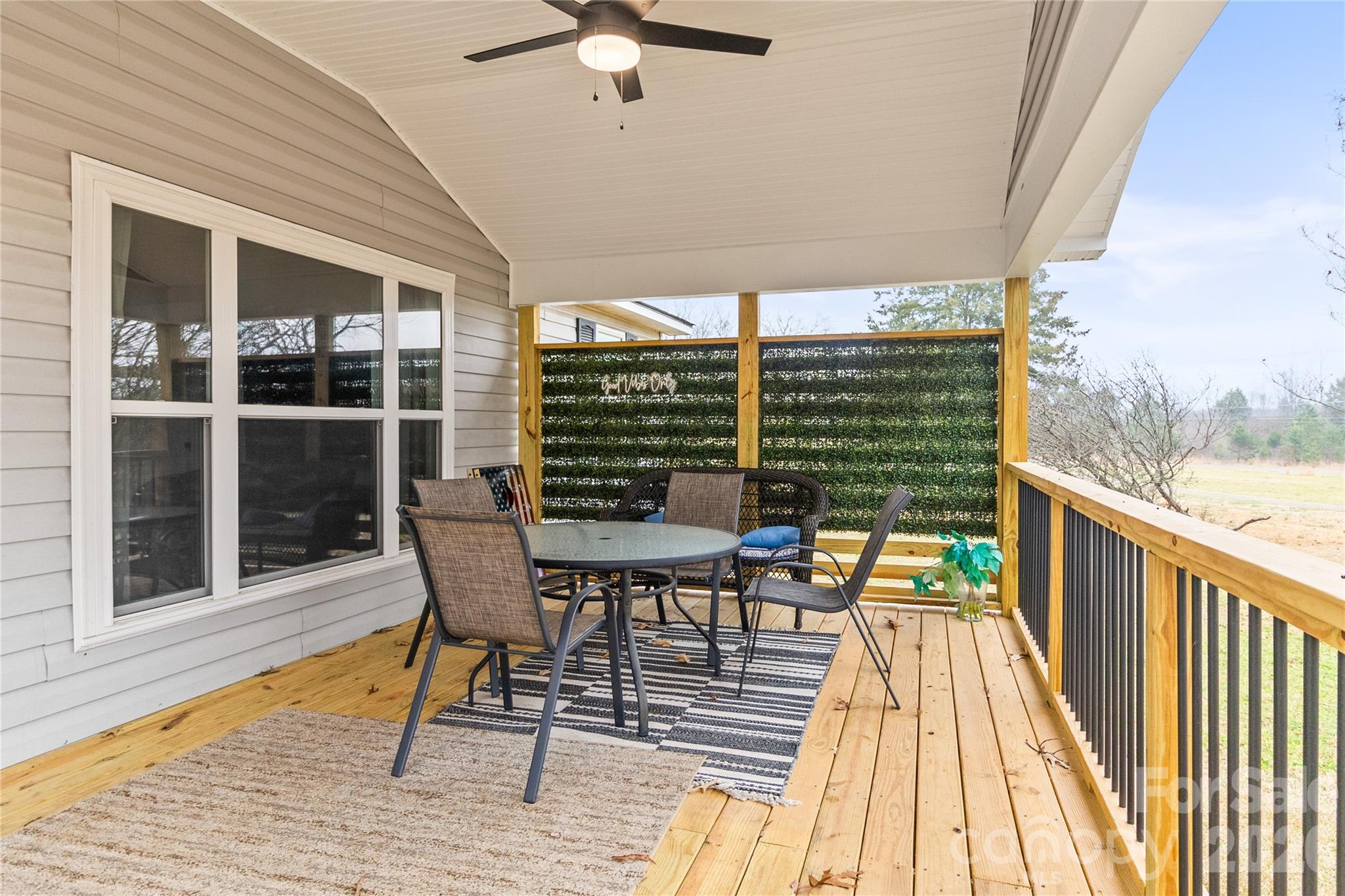 176 Odell School Road Concord, NC 28027 - Photo 8 of 46 a view of a balcony with chairs
