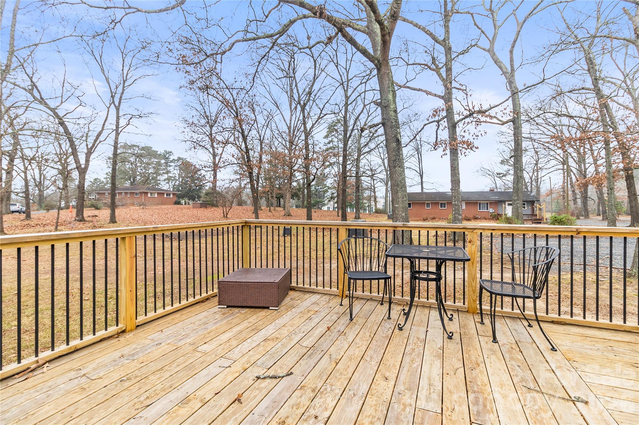 176 Odell School Road Concord, NC 28027 - Photo 9 of 46 a view of a wooden deck