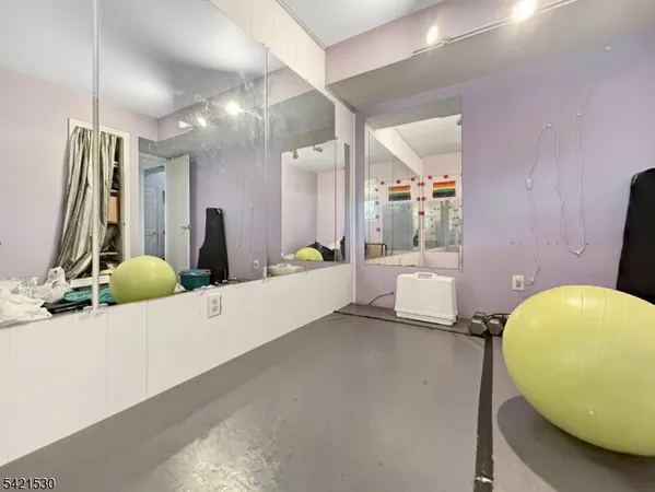 a view of a living room and bathroom