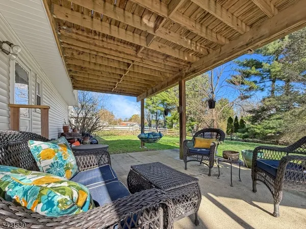 a outdoor living space with furniture and garden view