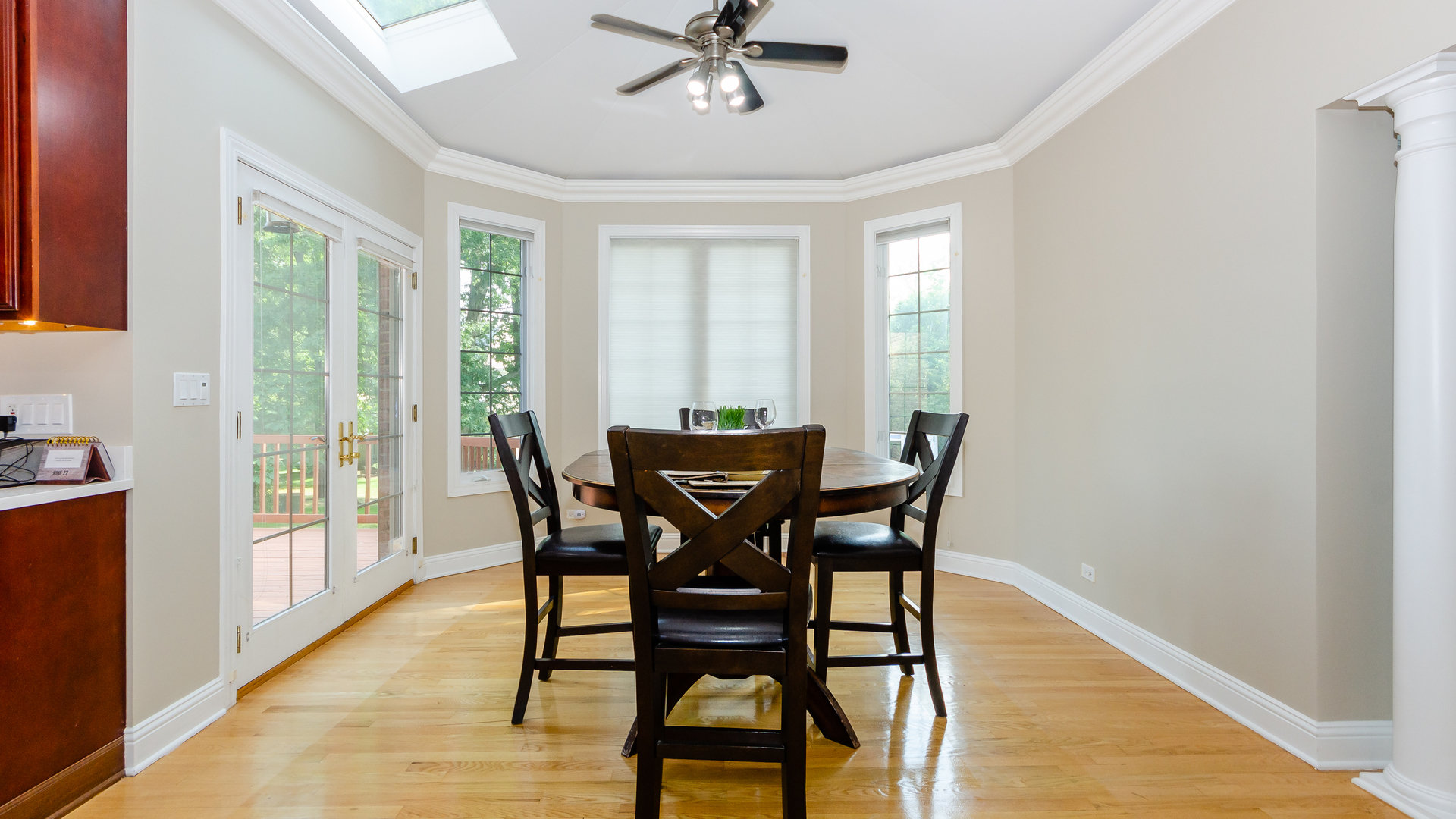 230 Devon Drive Burr Ridge, IL 60527 - Photo 24 of 94 a view of a dining room with furniture window and wooden floor