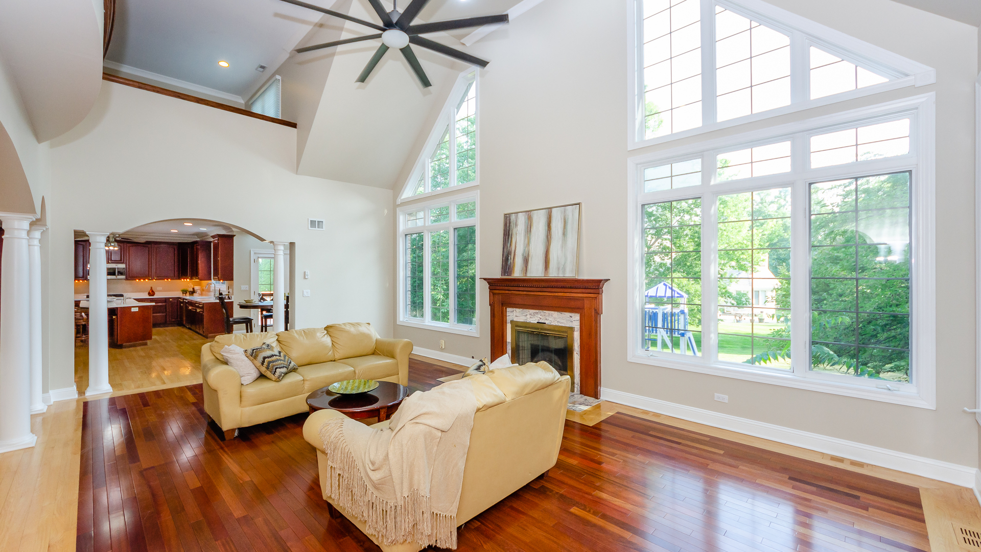 230 Devon Drive Burr Ridge, IL 60527 - Photo 29 of 94 a living room with furniture and a fireplace