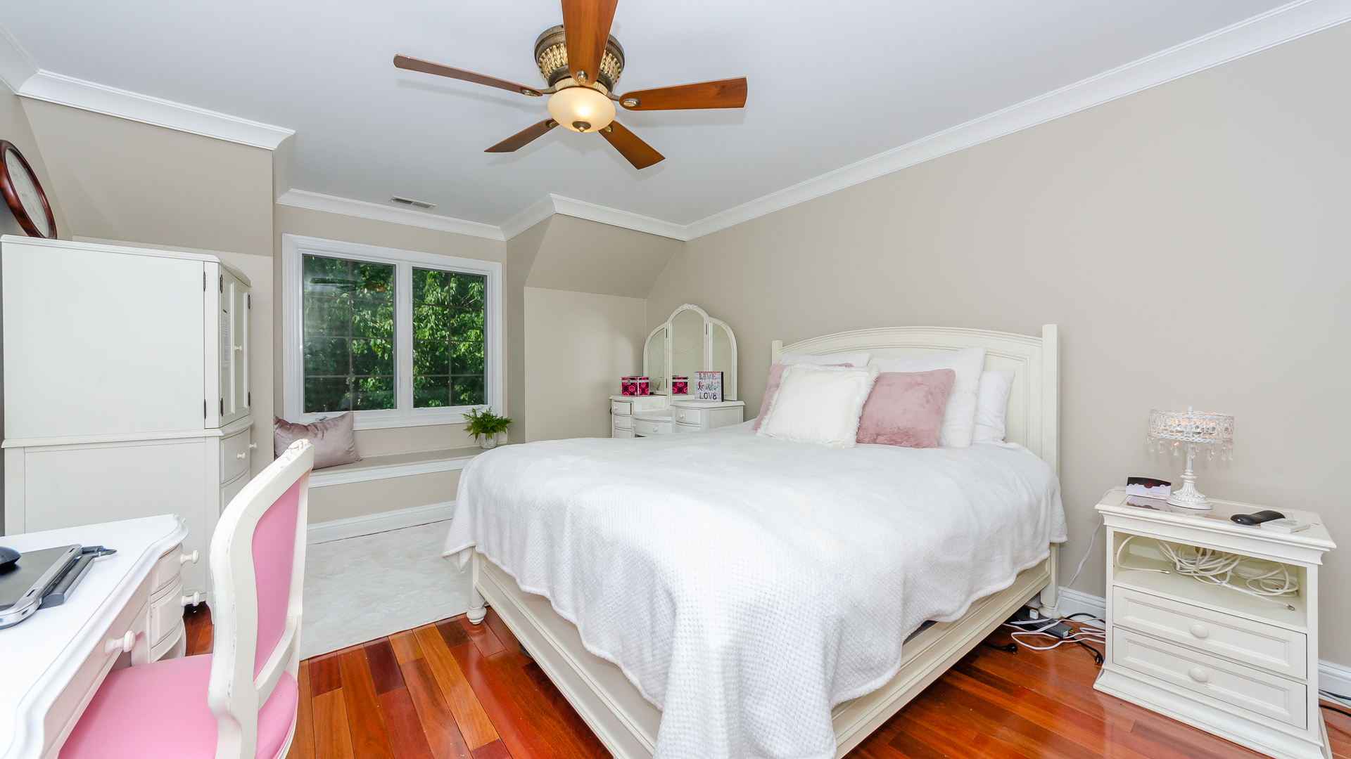 230 Devon Drive Burr Ridge, IL 60527 - Photo 47 of 94 a bedroom with a bed and a large window with the outer view