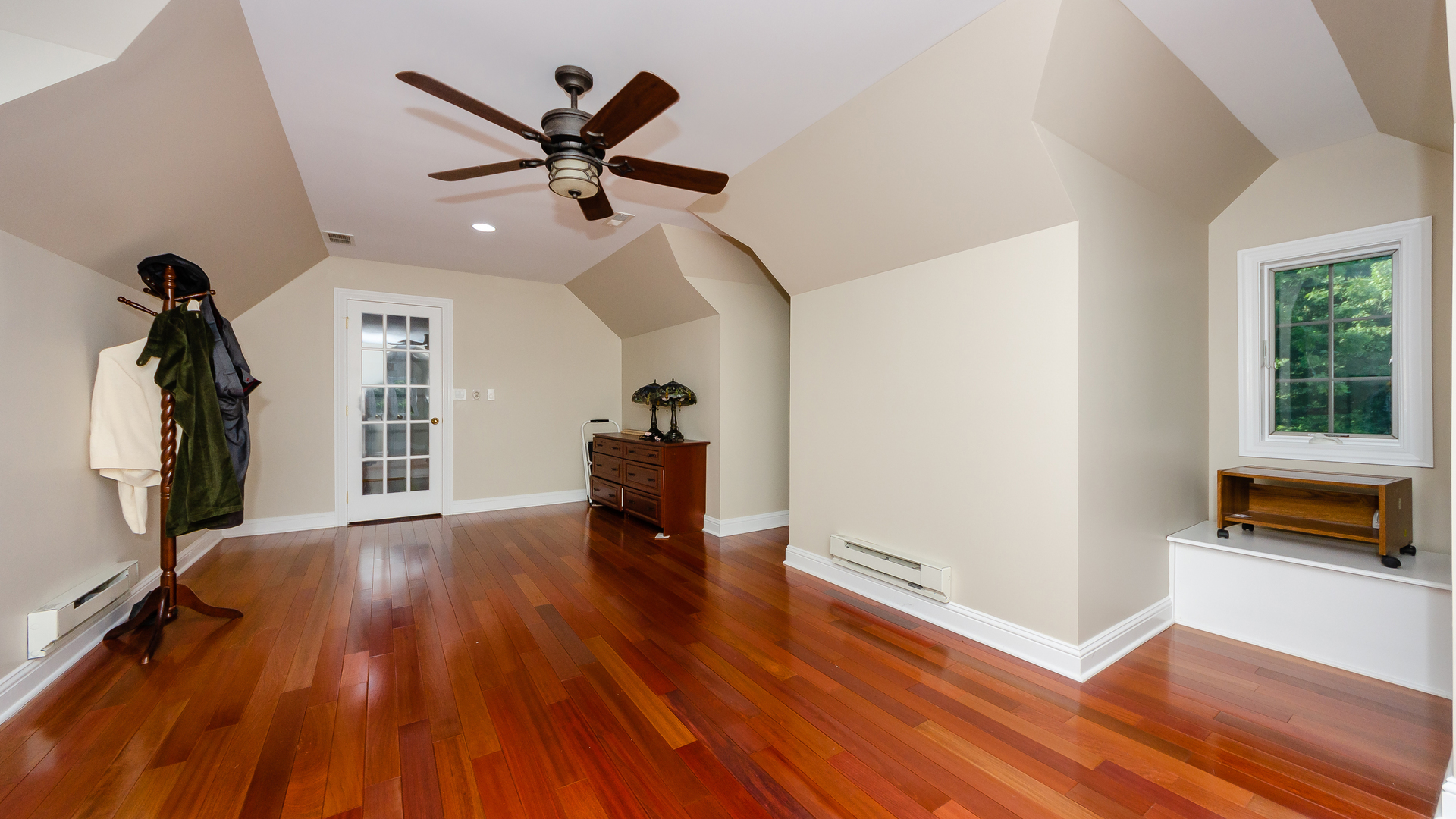 230 Devon Drive Burr Ridge, IL 60527 - Photo 66 of 94 a living room with furniture and a wooden floor