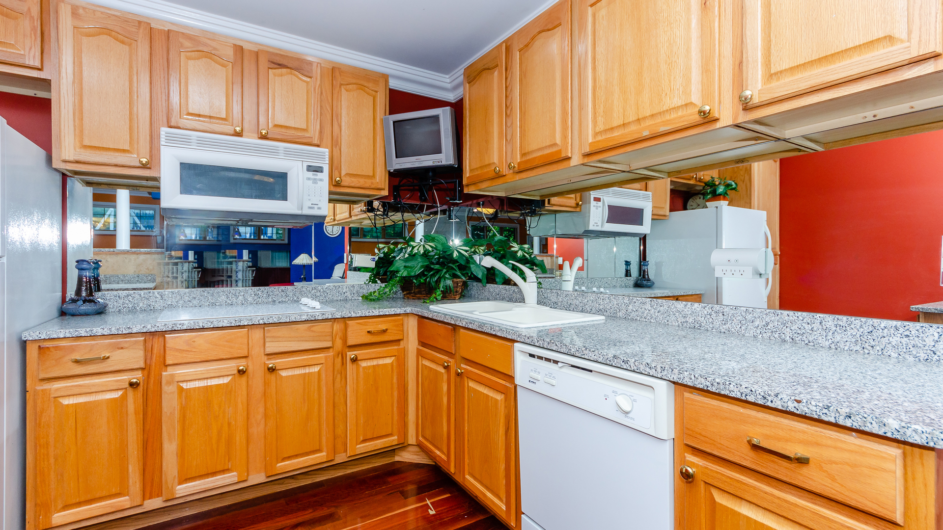 230 Devon Drive Burr Ridge, IL 60527 - Photo 75 of 94 a kitchen with stainless steel appliances granite countertop a sink and cabinets