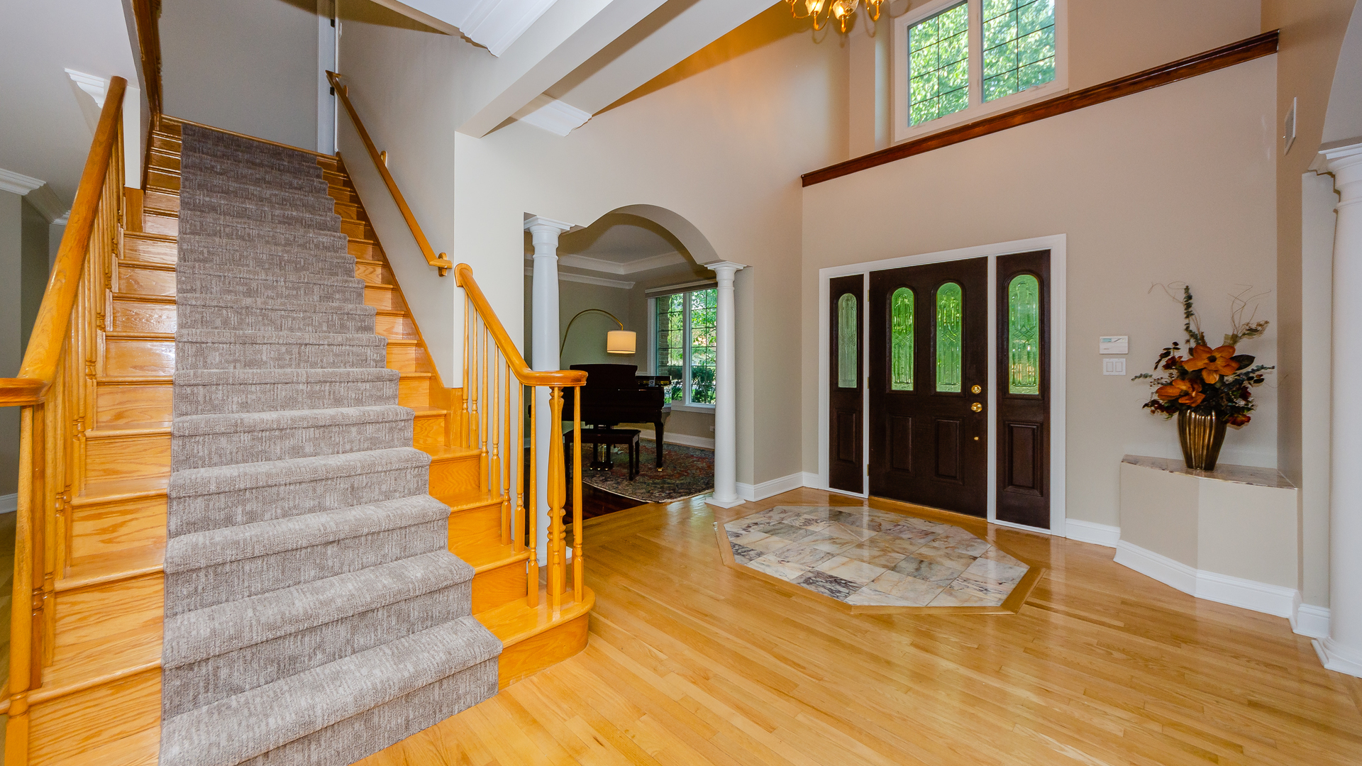 230 Devon Drive Burr Ridge, IL 60527 - Photo 10 of 94 a view of entryway and hall with wooden floor