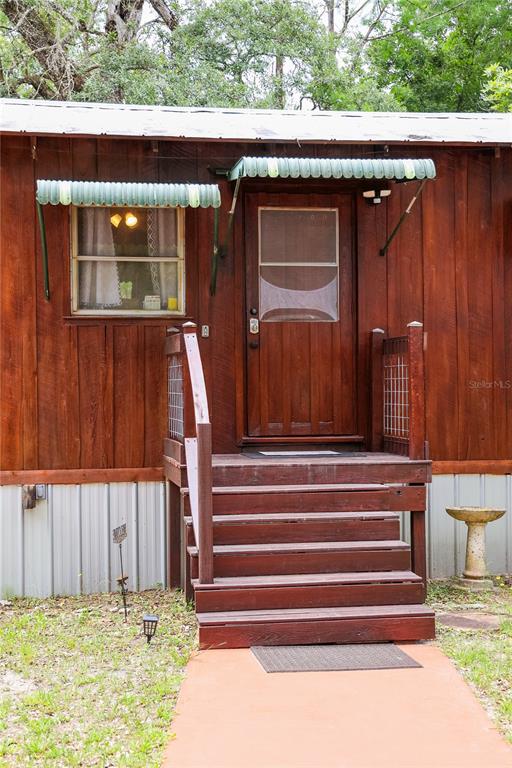 3850 Southeast 22 Court Bronson, FL 32621 - Photo 18 of 40 a view of entryway with a tub