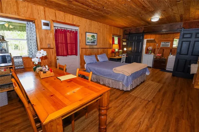 a bed room with a bed and furniture