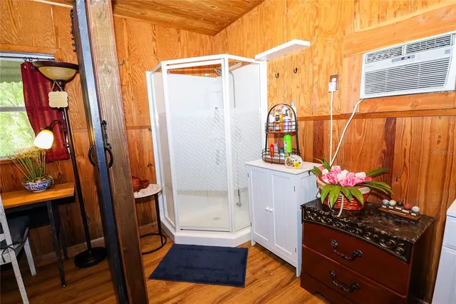 a living room with furniture and a gate