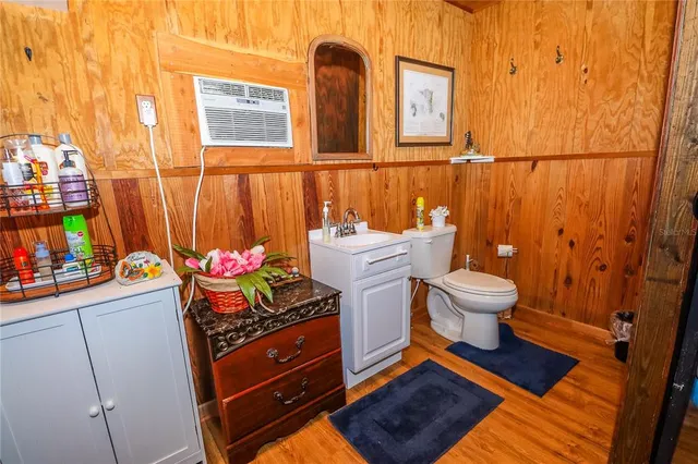 a bathroom with a toilet and a sink