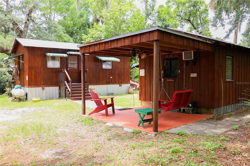 3850 Southeast 22 Court Bronson, FL 32621 - Photo 27 of 40 a view of a house with yard
