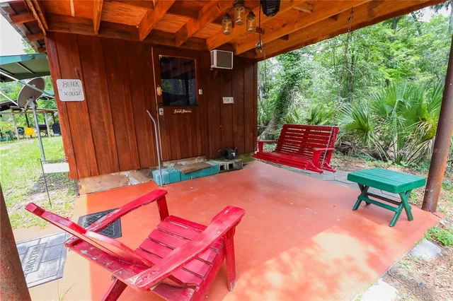 a view of a living room and dining room