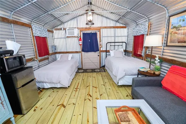 a bed room with a bed and a table